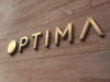 Optima. Muestra Logotipo en Pared